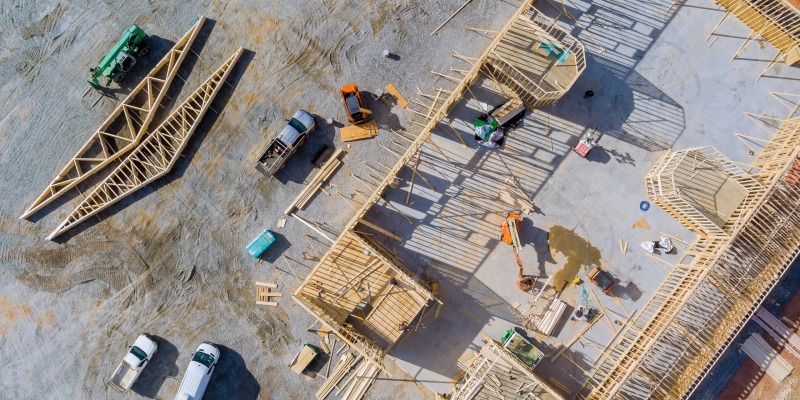 Building construction wood framing beams of a new house under construction